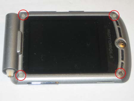 Remove the 4 rubber grommets and then the 4 TORX T5 screws behind